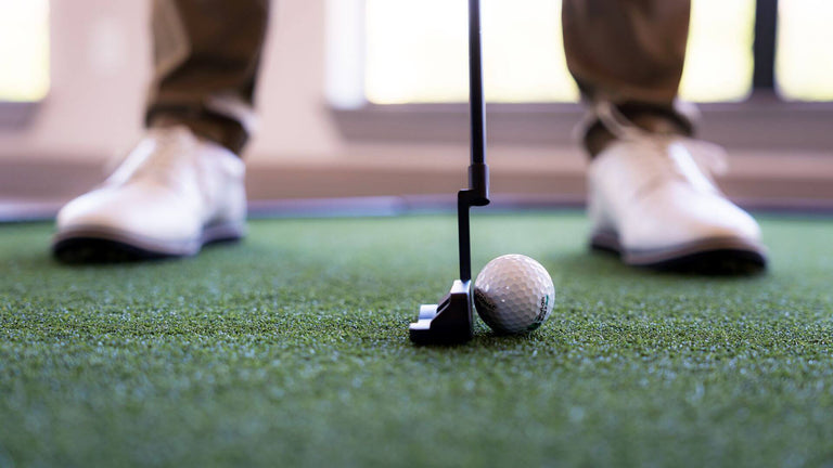 Golfer putting